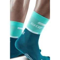 CEP The Run Mid Cut Compression Socks V4 - Ocean/petrol -RunGear Elite cep the run mid cut compression socks v4 ocean petrol 1 1553635
